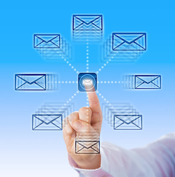 Index Finger Sending Email Icons Into Cyber Space